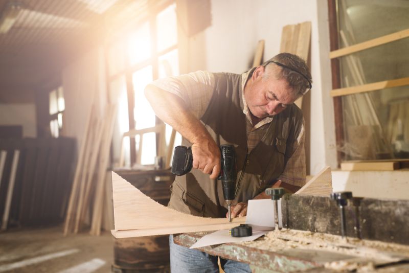 a carpenter at work in his workshop